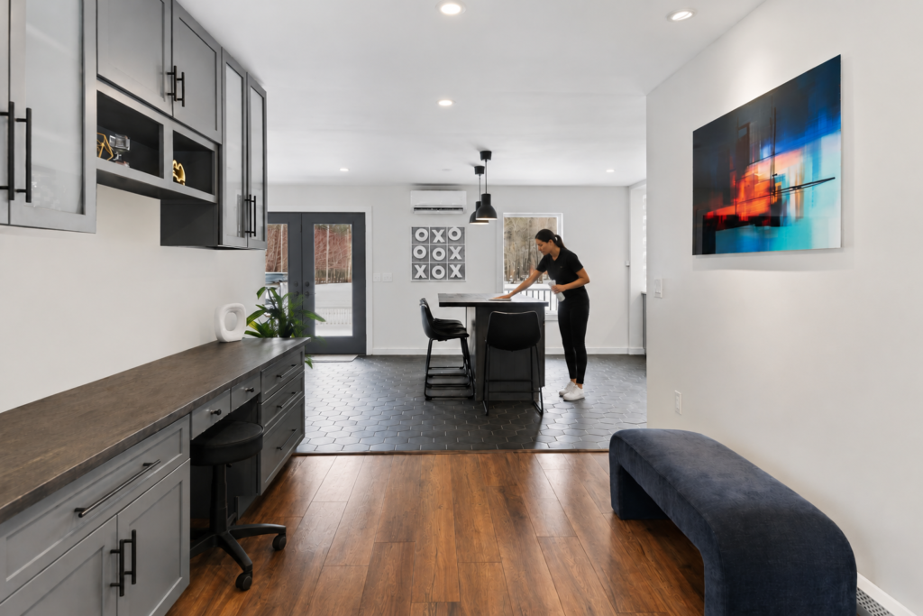 Woman Cleaning Kitchen Space
